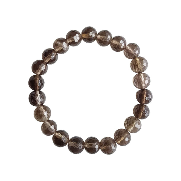 Close up image on a white background of a stretchy Smoky Quartz mala bracelet. The bracelet is made of 8mm faceted light brown Smoky Quartz beads.